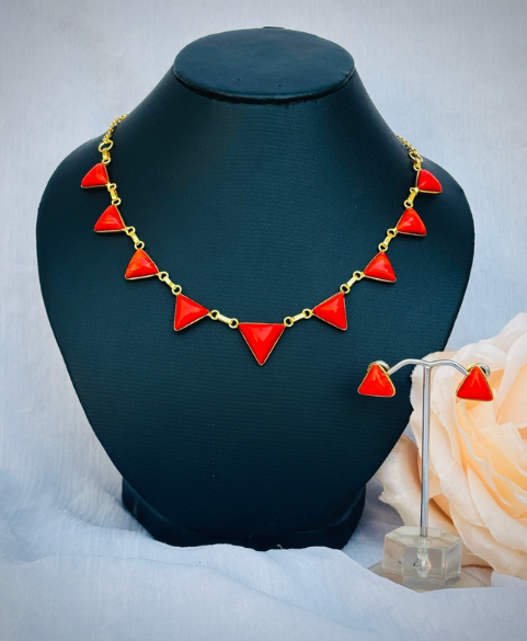 Coral neckpiece with studs