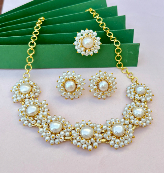 Pearl necklace set with ring and studs